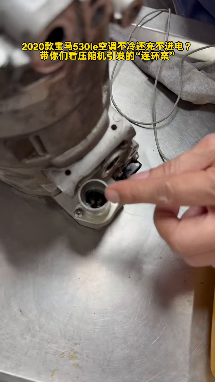 Open refrigerant port on the removed compressor