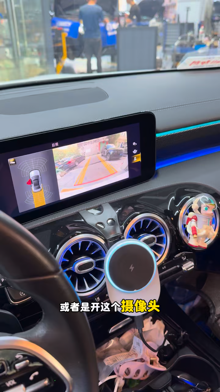 Mercedes A200 center display showing the reverse-camera view when the fault-triggering function is invoked.
