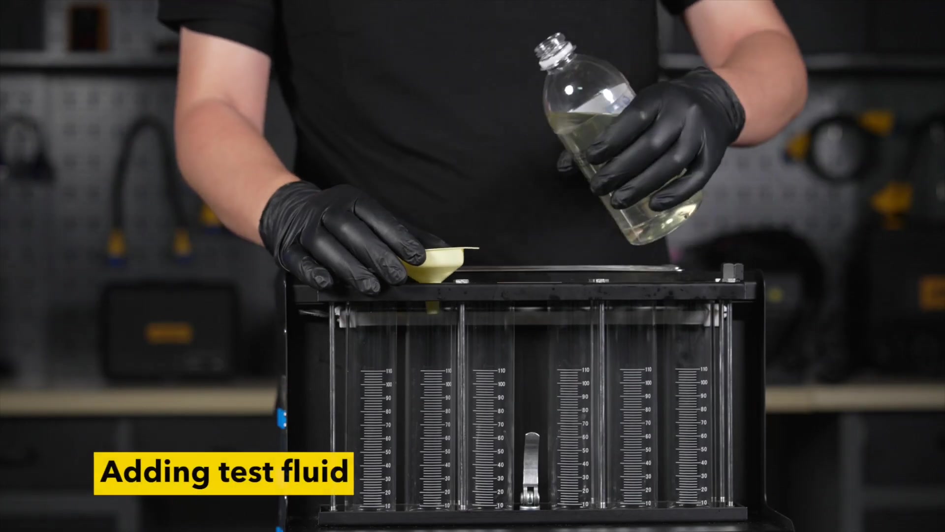 AUTOOL CT500 dedicated injector test fluid being added to the test circuit