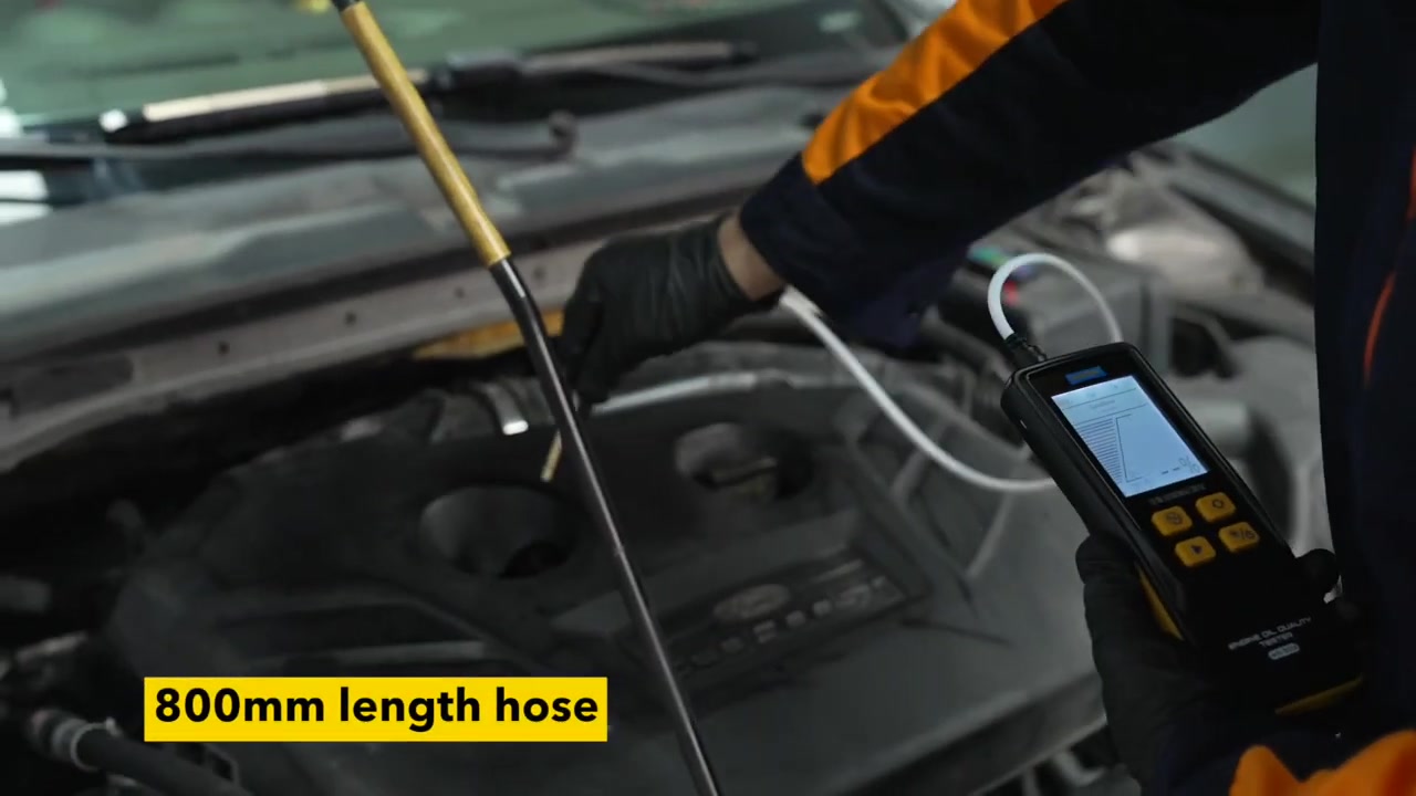 AUTOOL AS503 flexible probe routed through an engine oil dipstick tube
