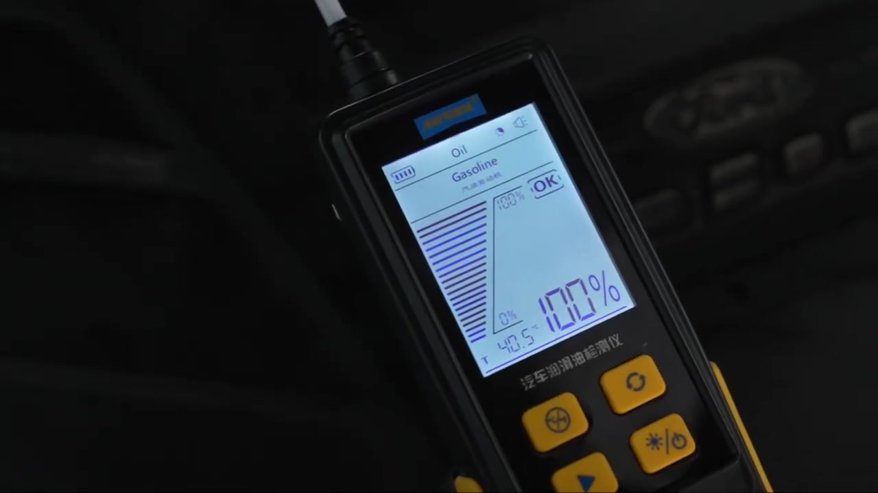 AUTOOL AS503 showing a 100 percent transmittance OK result and oil temperature