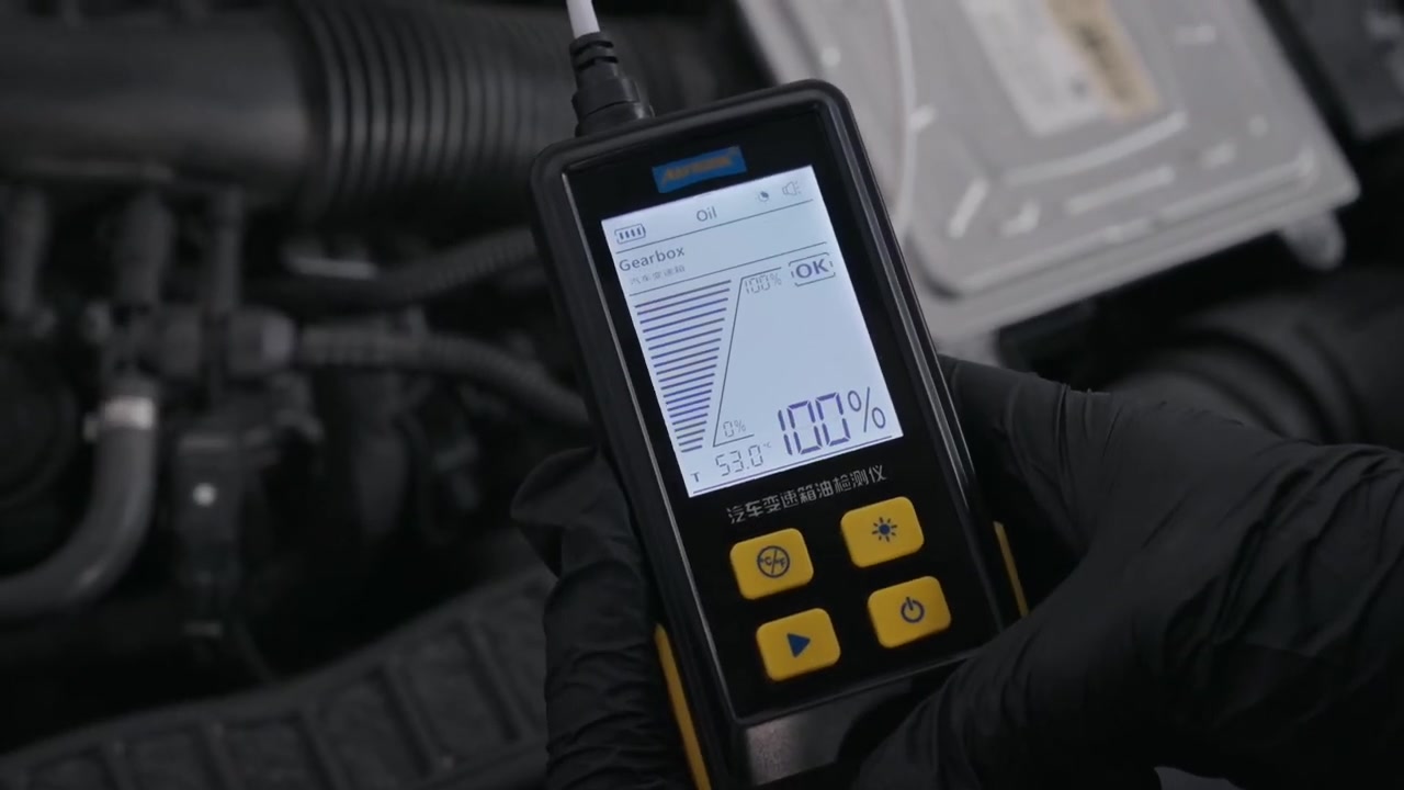AUTOOL AS505 showing a 100 percent transmittance OK result and transmission fluid temperature