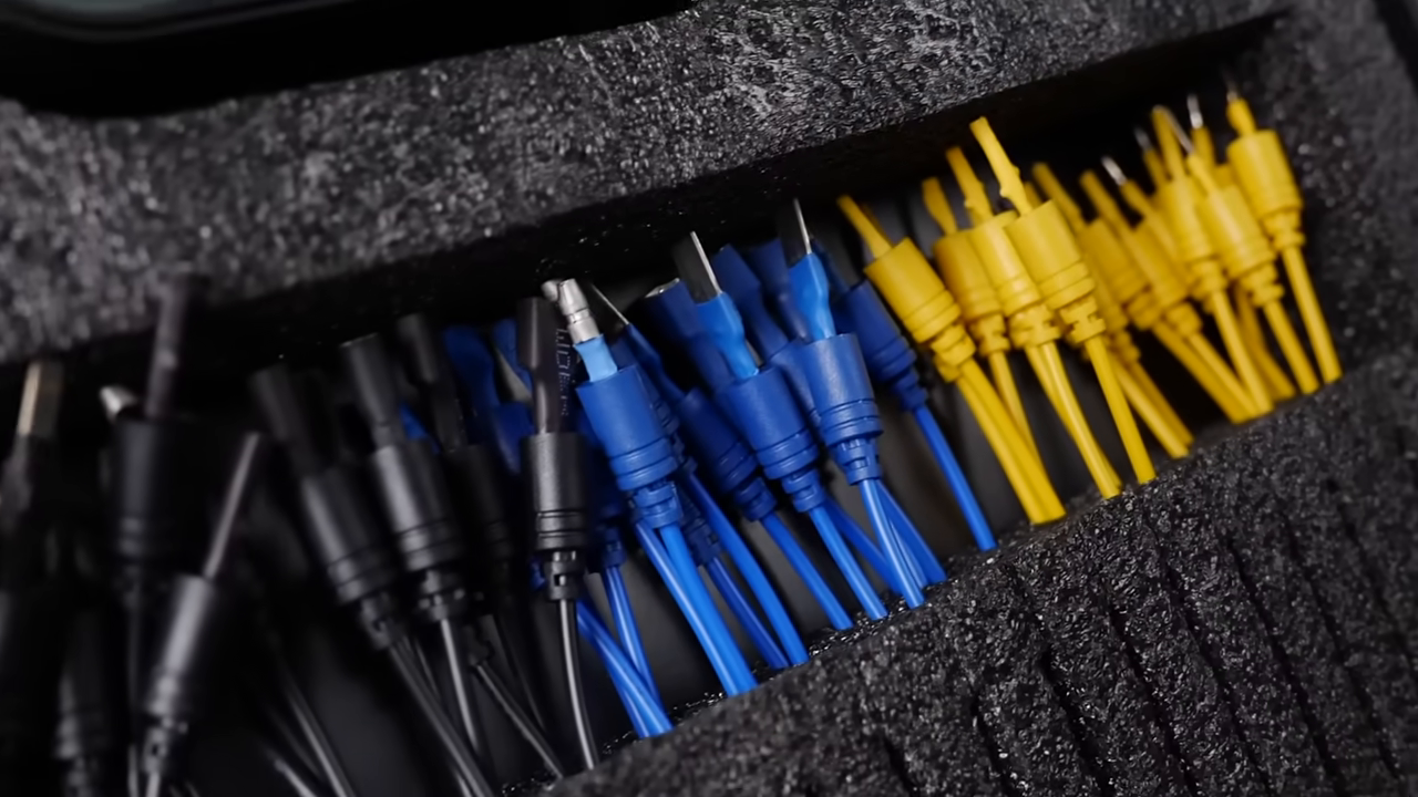 Close view of blue yellow black and red terminal lead groups stored in the AUTOOL 92-piece case.