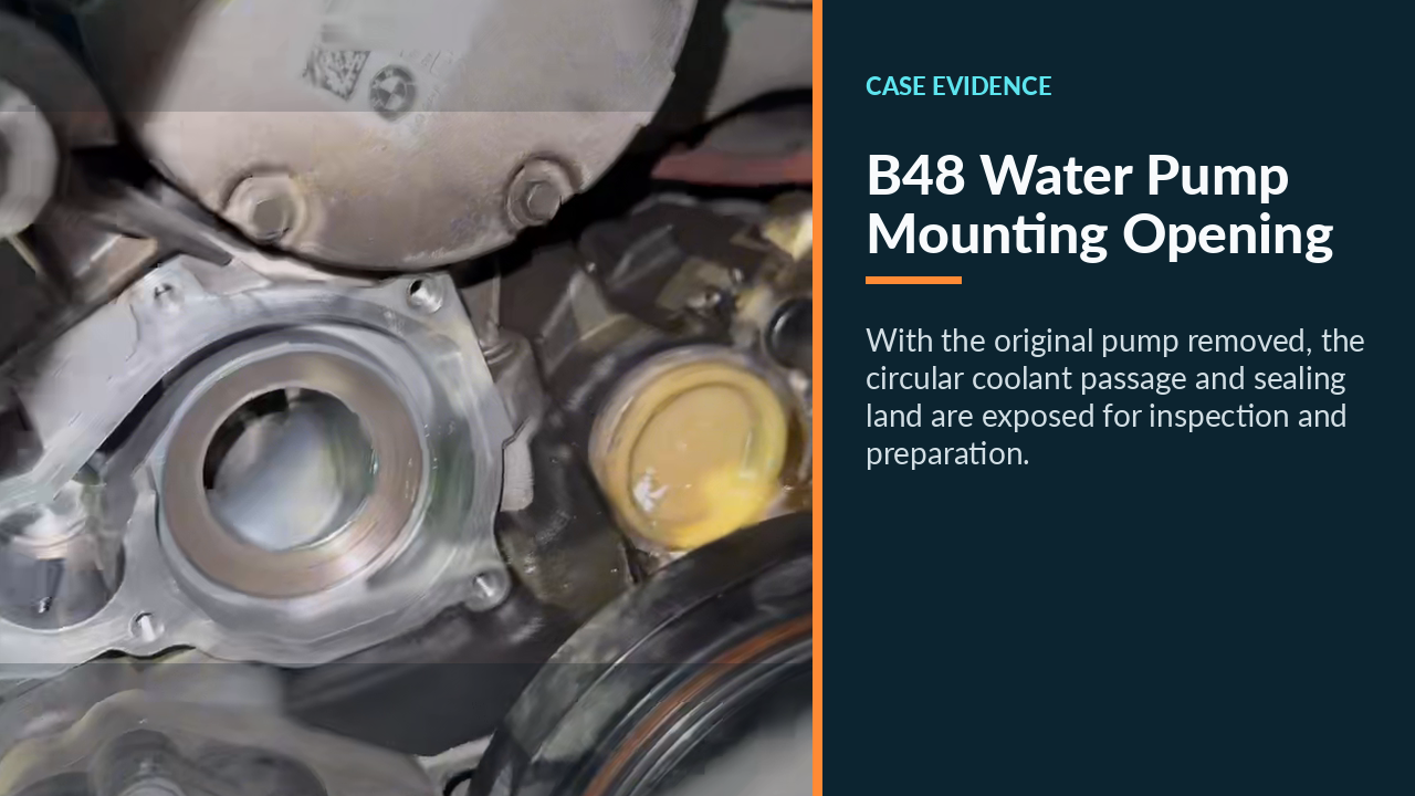 Open B48 water-pump mounting location after the original pump was removed.