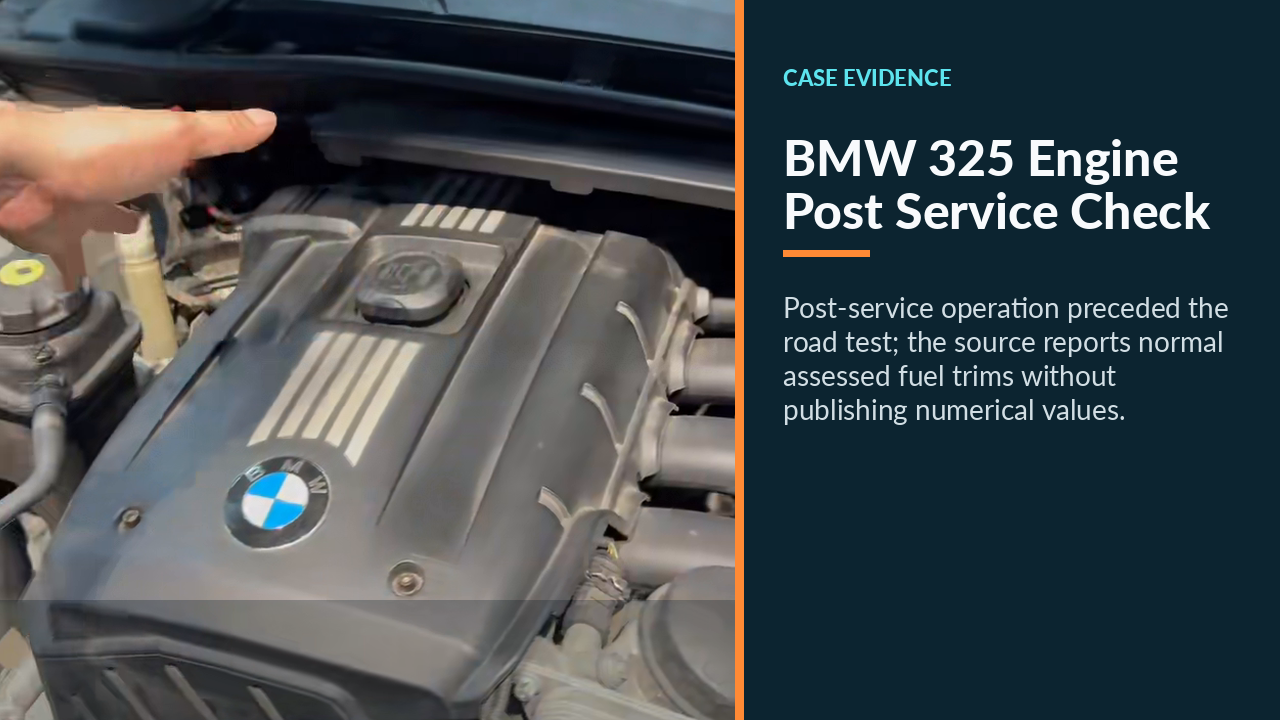 BMW 325 engine bay during the post-service operating check.