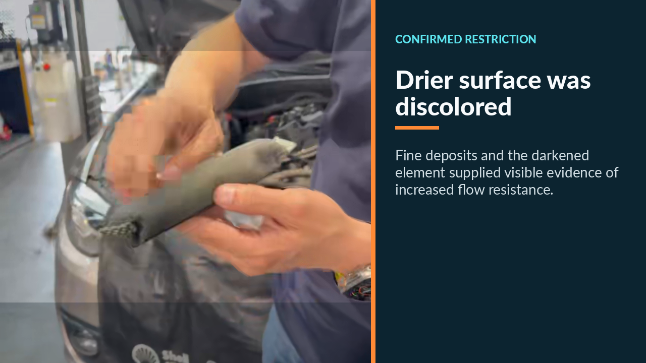 Discolored restricted BMW condenser drier element with fine deposits