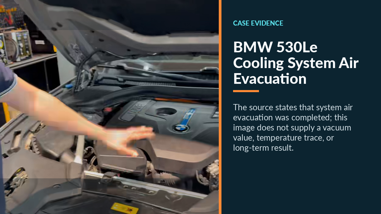 Reassembled BMW 530Le engine bay after cooling-system air evacuation.
