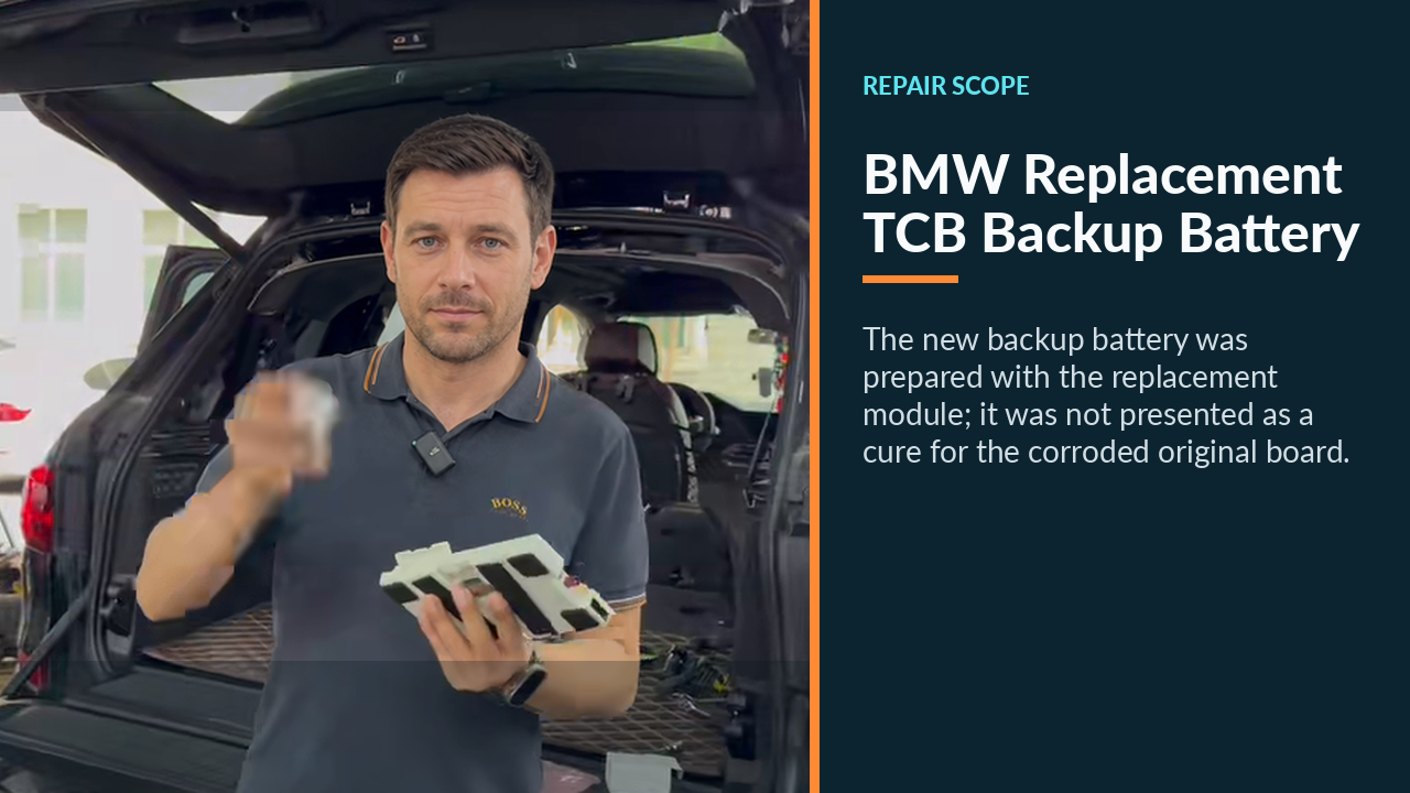 Technician installing a new backup battery into the replacement BMW TCB module.
