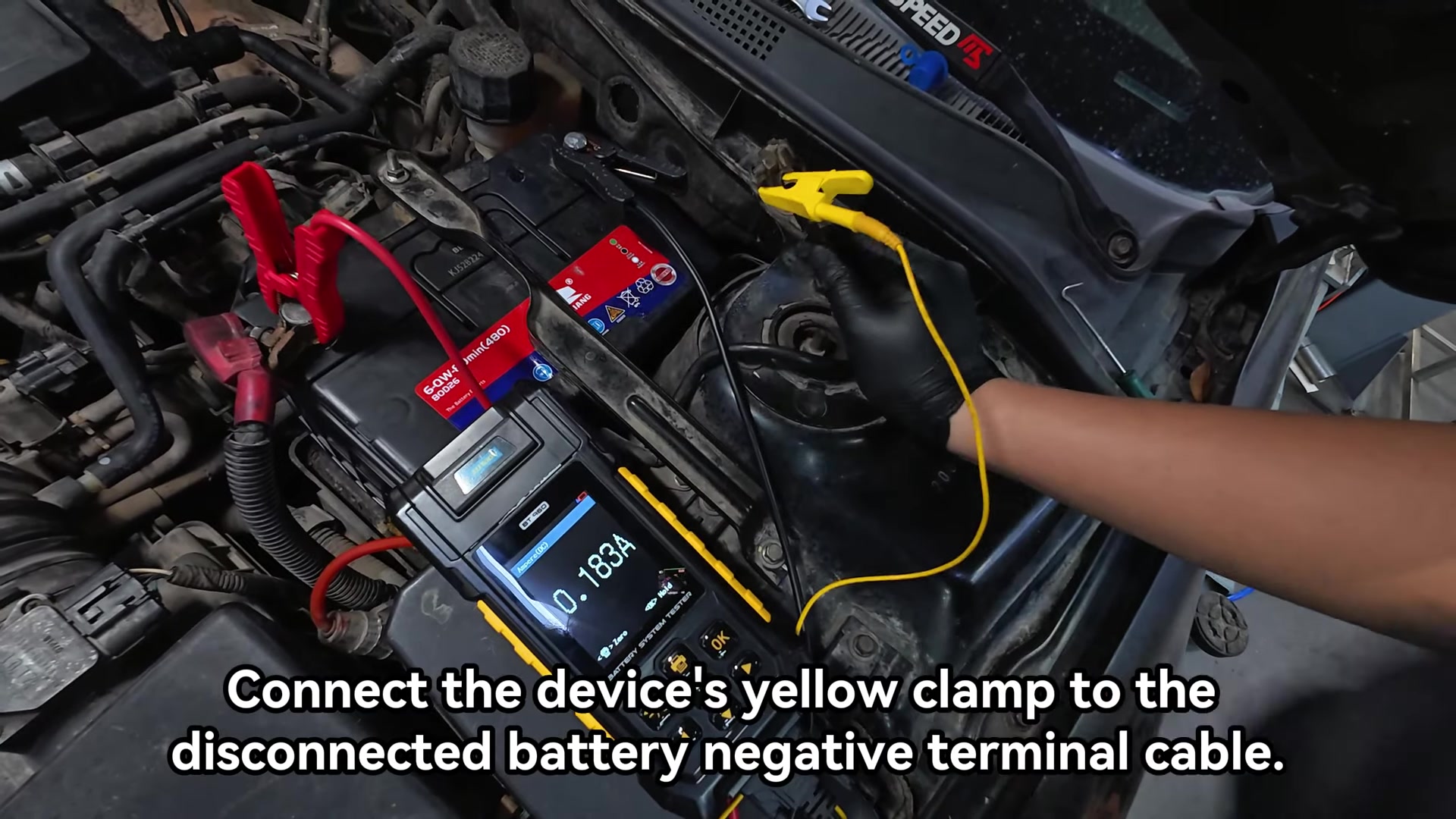 AUTOOL BT960 yellow current lead attached to the disconnected vehicle negative cable