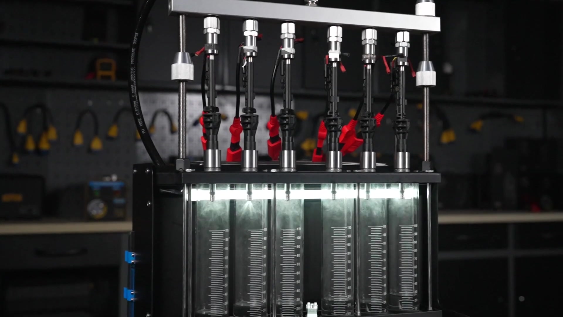 AUTOOL CT500 six measuring cylinders during a matched injector comparison
