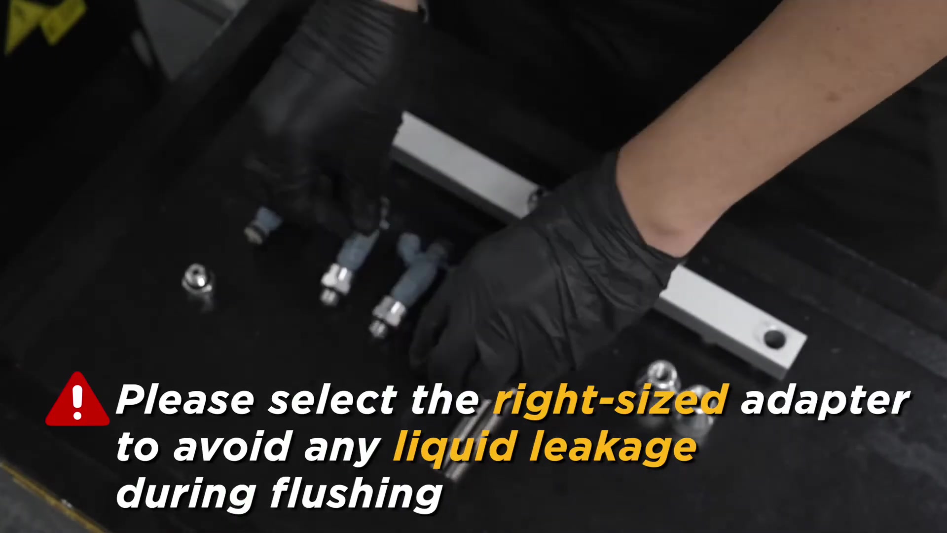 Technician matching an AUTOOL CT500 adapter to the outlet end of a fuel injector