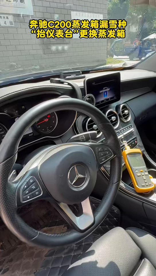 Reassembled Mercedes C200 dashboard and controls after evaporator replacement