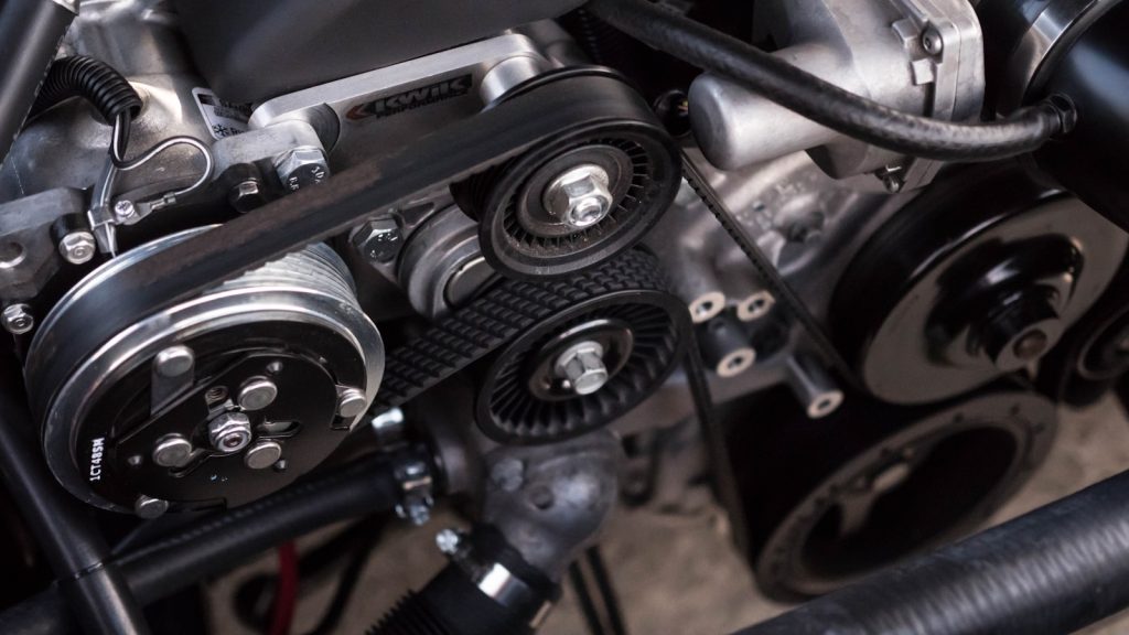 Open vehicle engine compartment during service