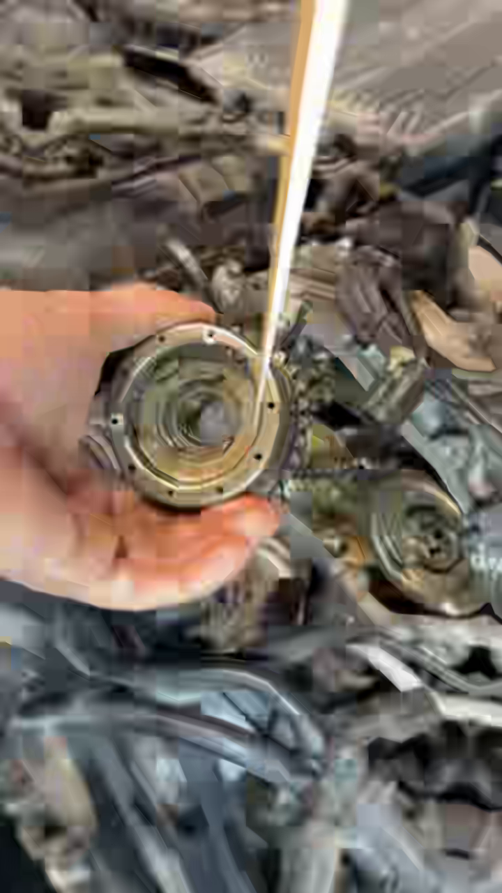 Removed Bank 2 intake cam adjuster at 36 seconds