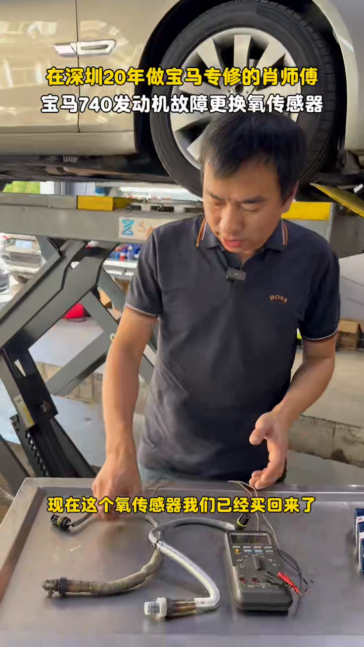 Technician comparing the BMW oxygen sensors at 16 seconds