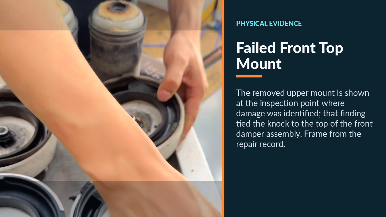Removed damaged upper mount from the 2013 BMW X5 front damper assembly