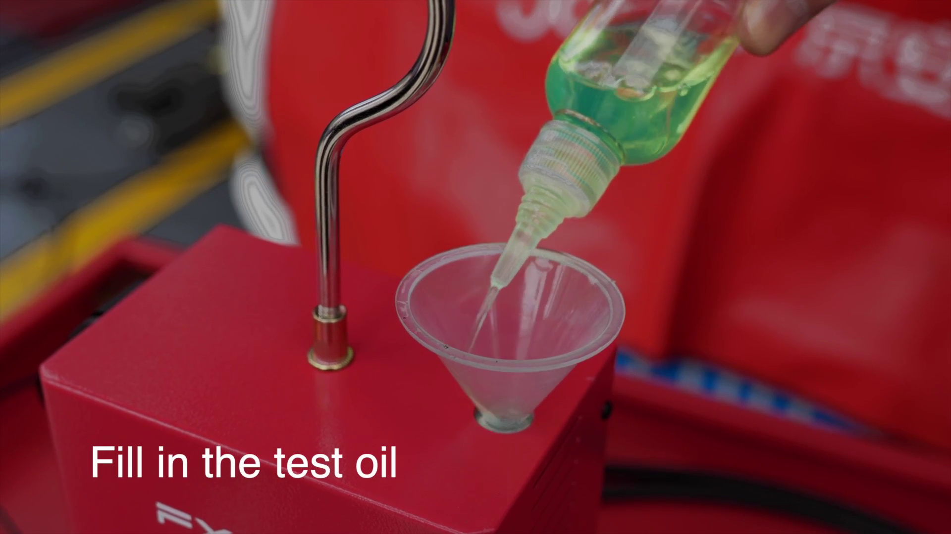 Adding smoke oil through the FXTUL F603 top fill port with a funnel