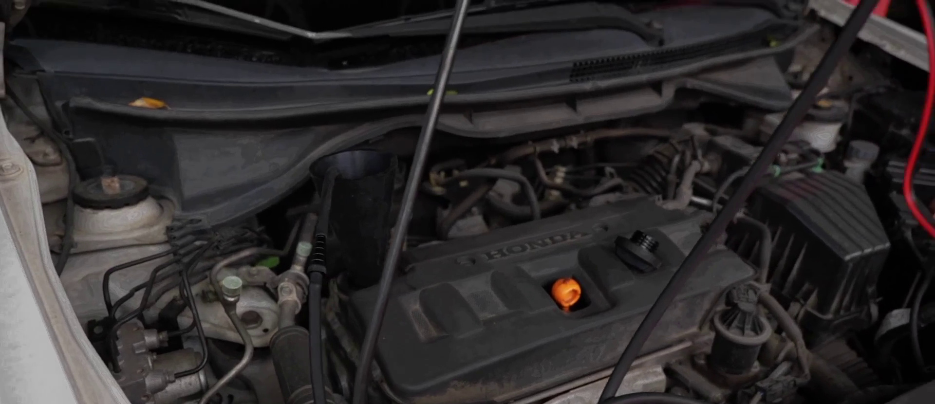 Engine-bay test path connected for inspection with an FXTUL F703 smoke leak detector