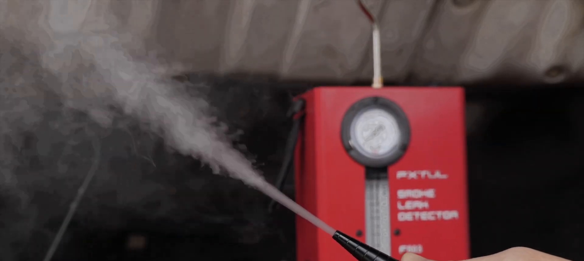 Visible smoke leaving the FXTUL F803 nozzle before it is inserted into the test path