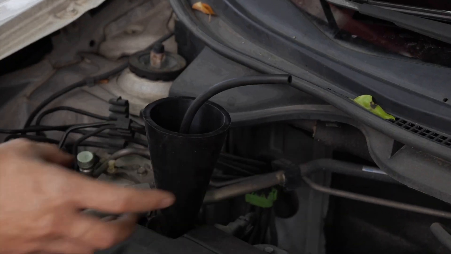 Cone adapter placed at an intake opening before connecting the FXTUL F803 smoke nozzle