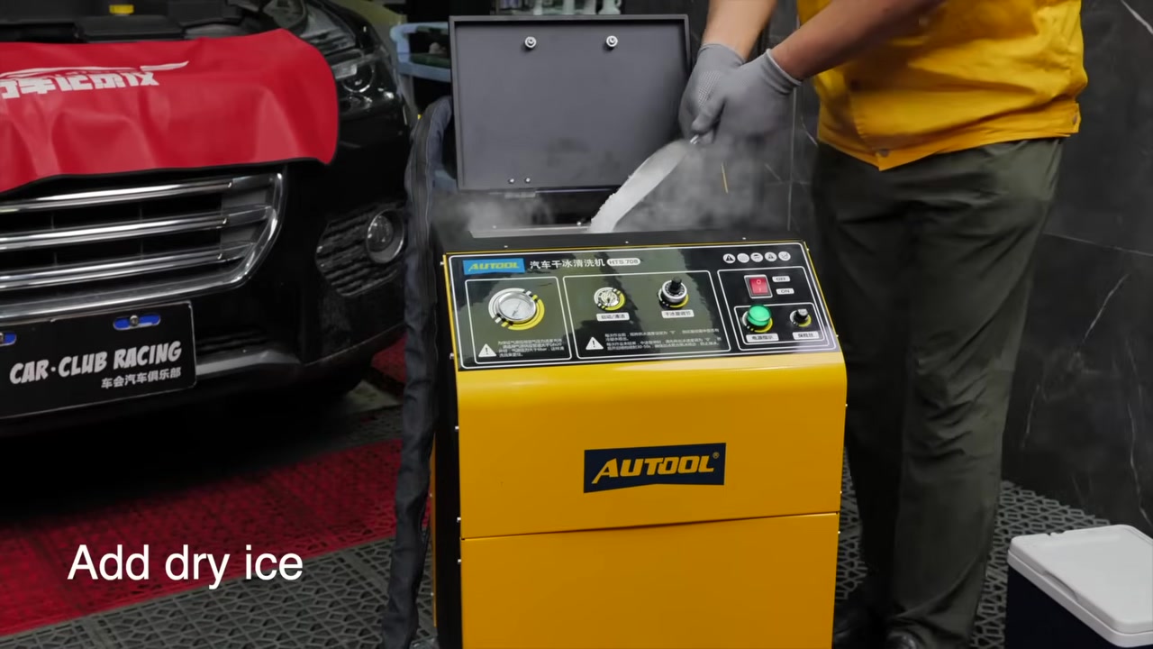 Technician loading dry ice into the AUTOOL HTS708 hopper