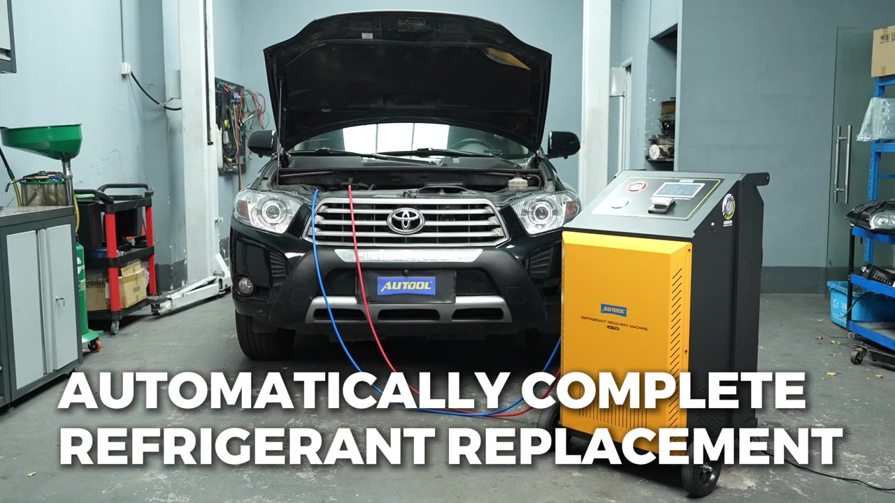 AUTOOL LM708 connected to a vehicle in a ventilated workshop bay