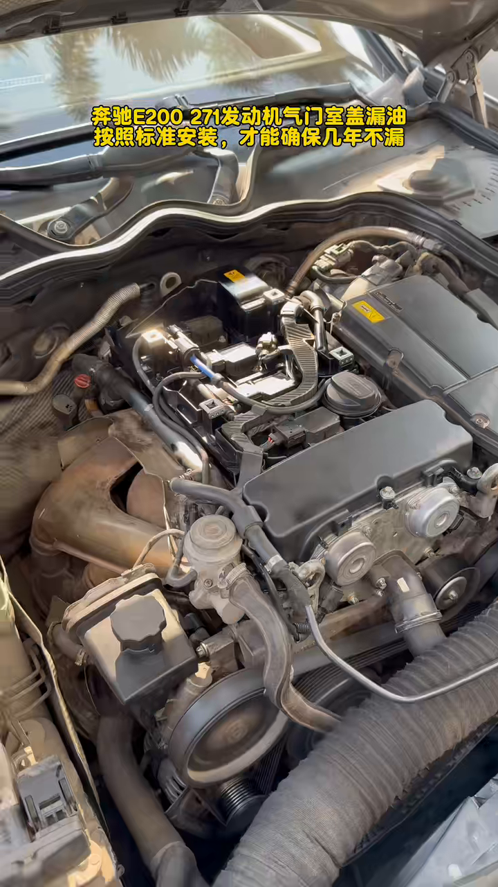 Mercedes M271 cylinder head exposed with the valve cover removed