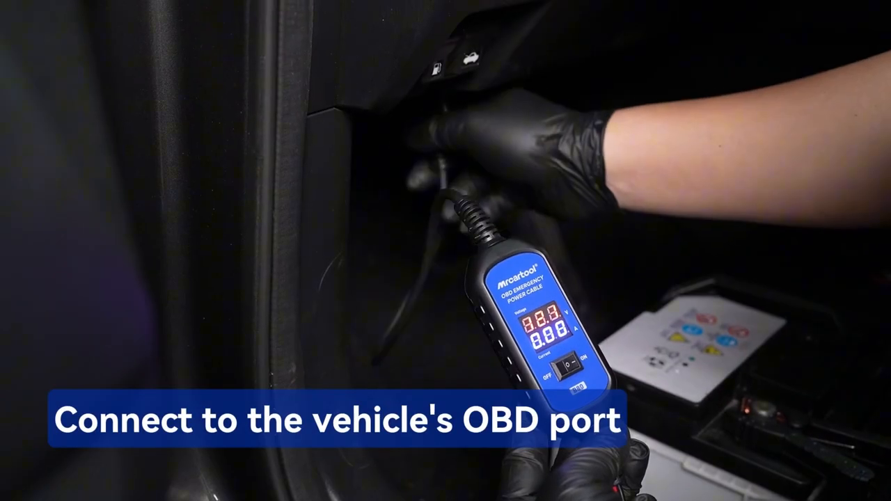 Official B80 tutorial frame showing the energized tool being inserted into the vehicle diagnostic connector.