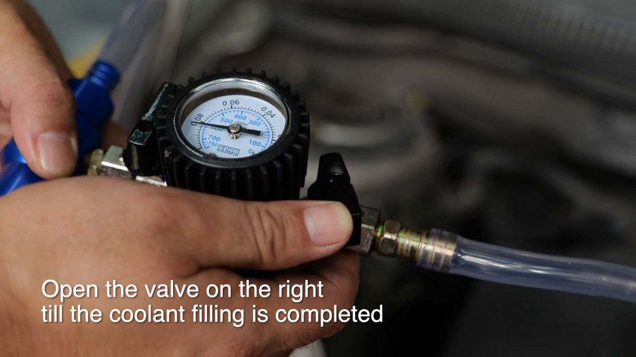 Official MRCARTOOL video frame showing valve 2 opened for the coolant filling stage.