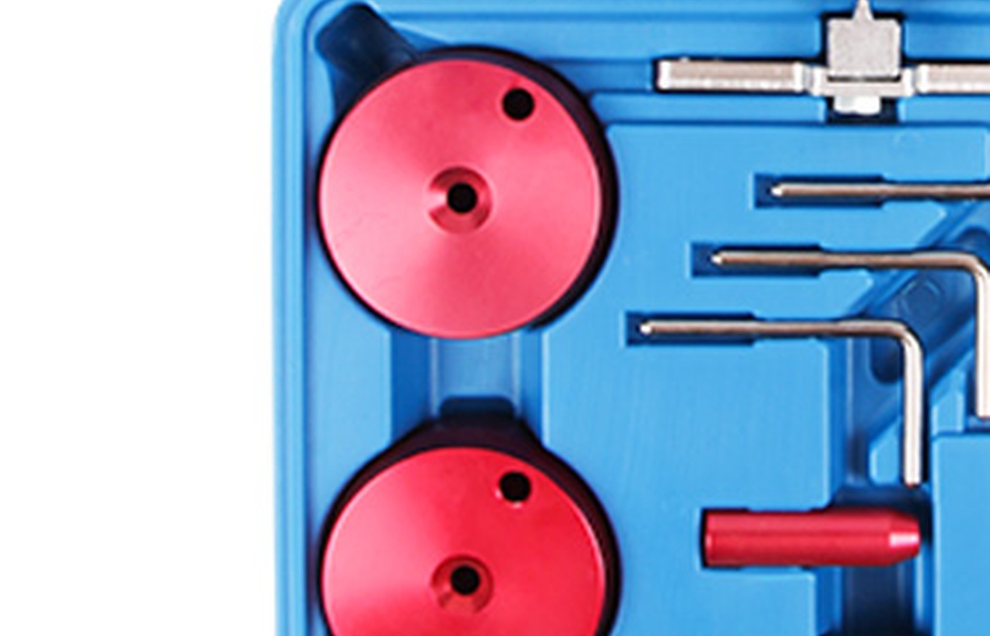 Source-derived close view of the left-side fixtures and pin-type pieces in the official case image.