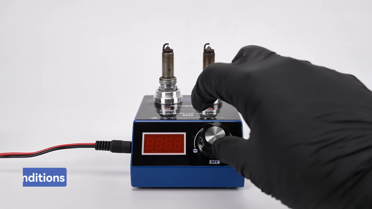 Frame from the exact official H90 tutorial showing the rotary switch being turned on after both plugs and 12 V lead are installed.