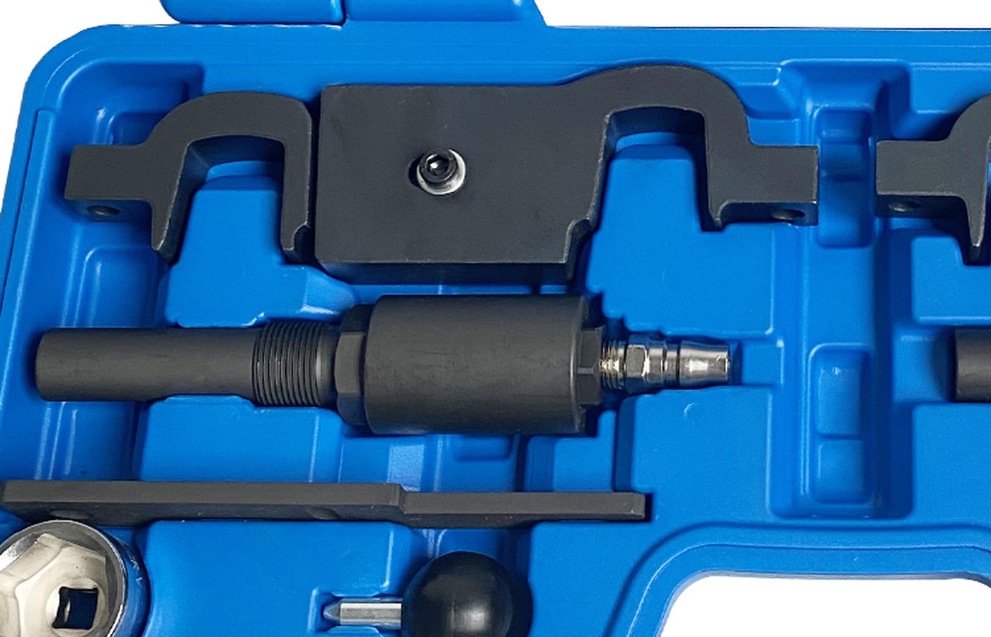 Source-derived close view of the left-side fixtures and pin-type pieces in the official case image.