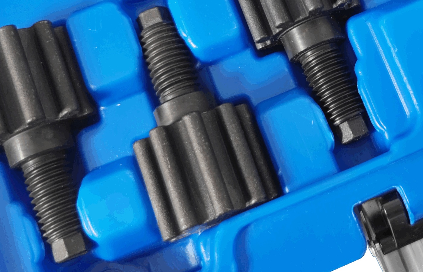 Source-derived close view of the left-side fixtures and pin-type pieces in the official case image.