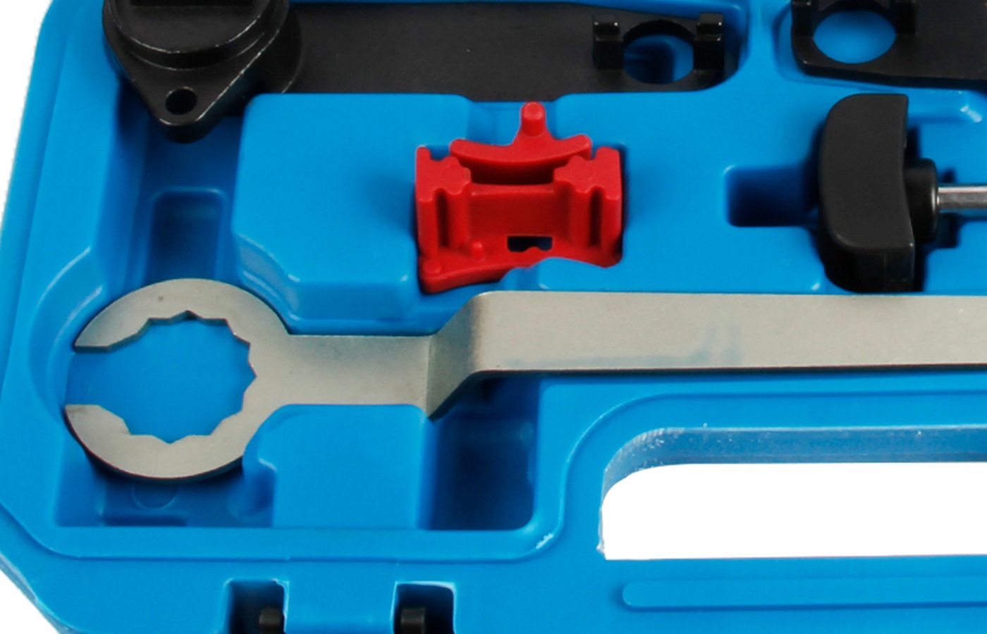 Source-derived close view of the left-side fixtures and pin-type pieces in the official case image.