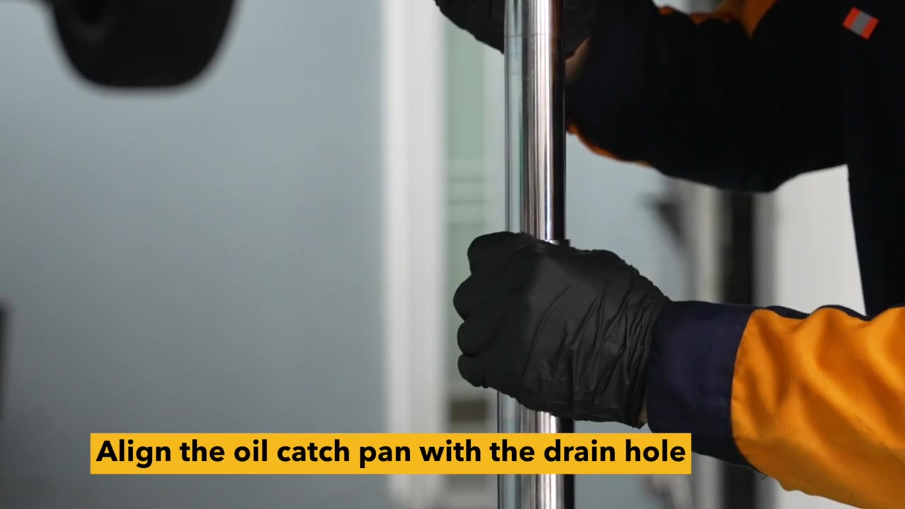 AUTOOL OD710 catch pan aligned directly below the engine oil drain point