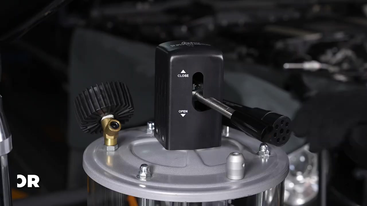 AUTOOL OD760 measuring-cup press valve showing its open and close positions