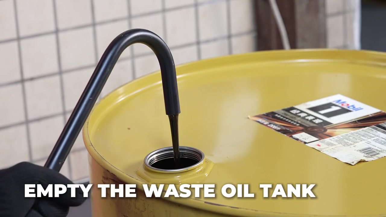 AUTOOL OD760 drain hose emptying waste engine oil into a stable approved receiving container