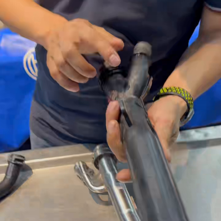 Removed polymer pipe and metal replacement shown together.
