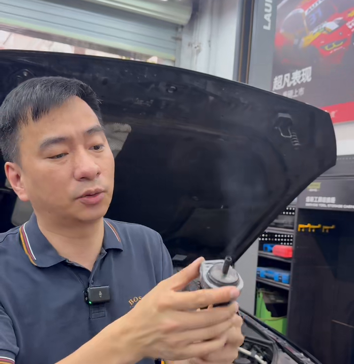 Removed purge valve and test hose shown during the leak-path explanation