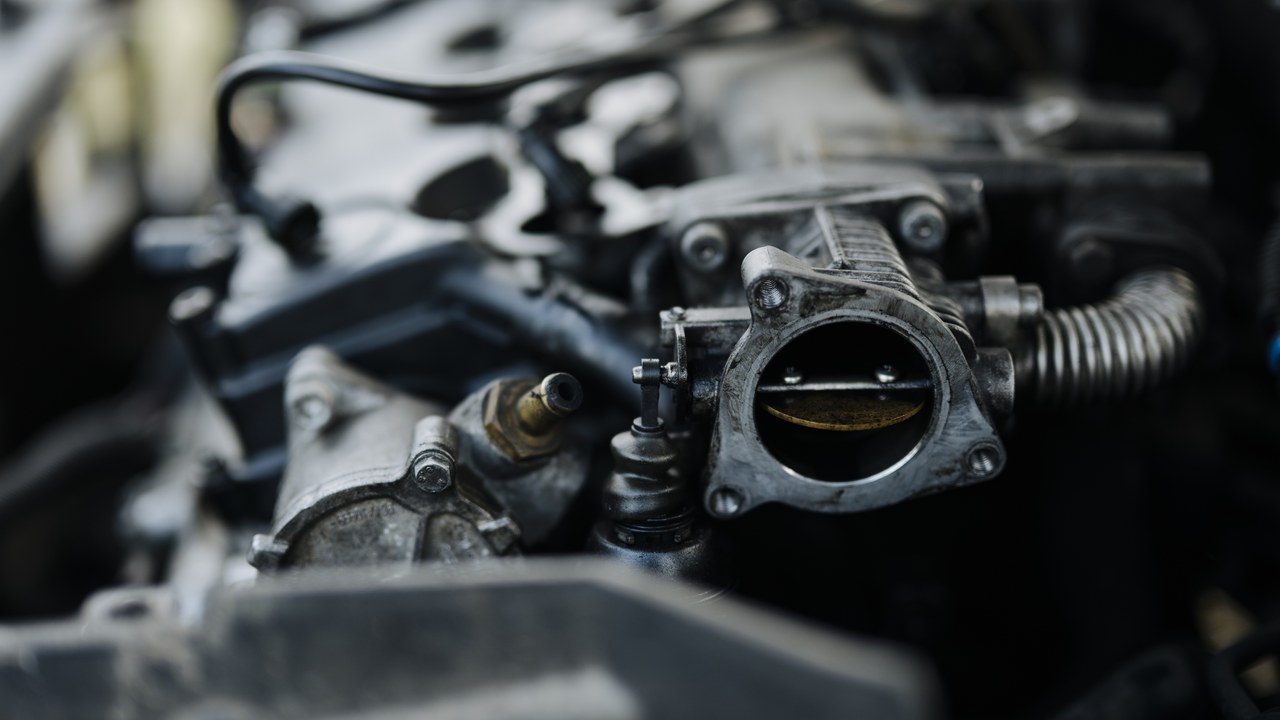 Throttle body exposed during an engine air-path inspection