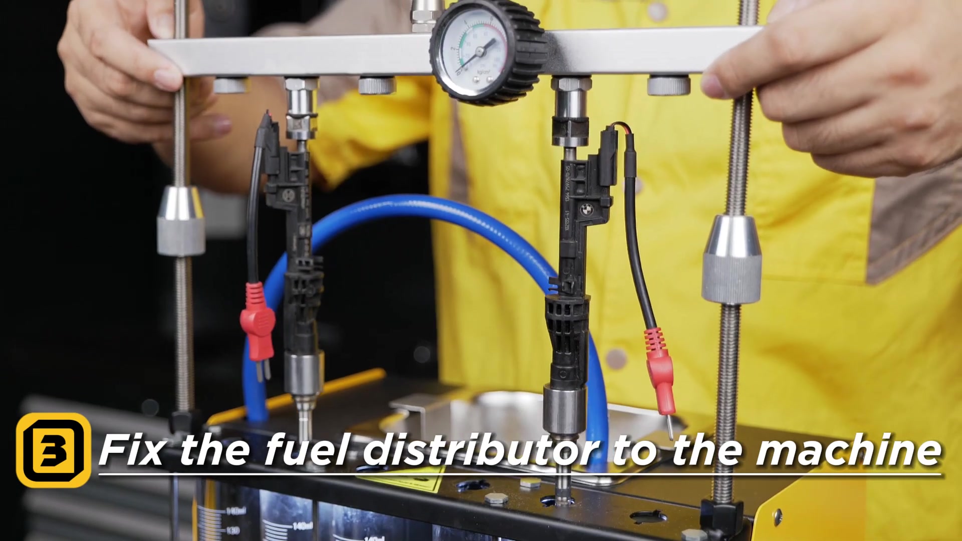CT400 fuel distributor being secured over two mounted GDI injectors