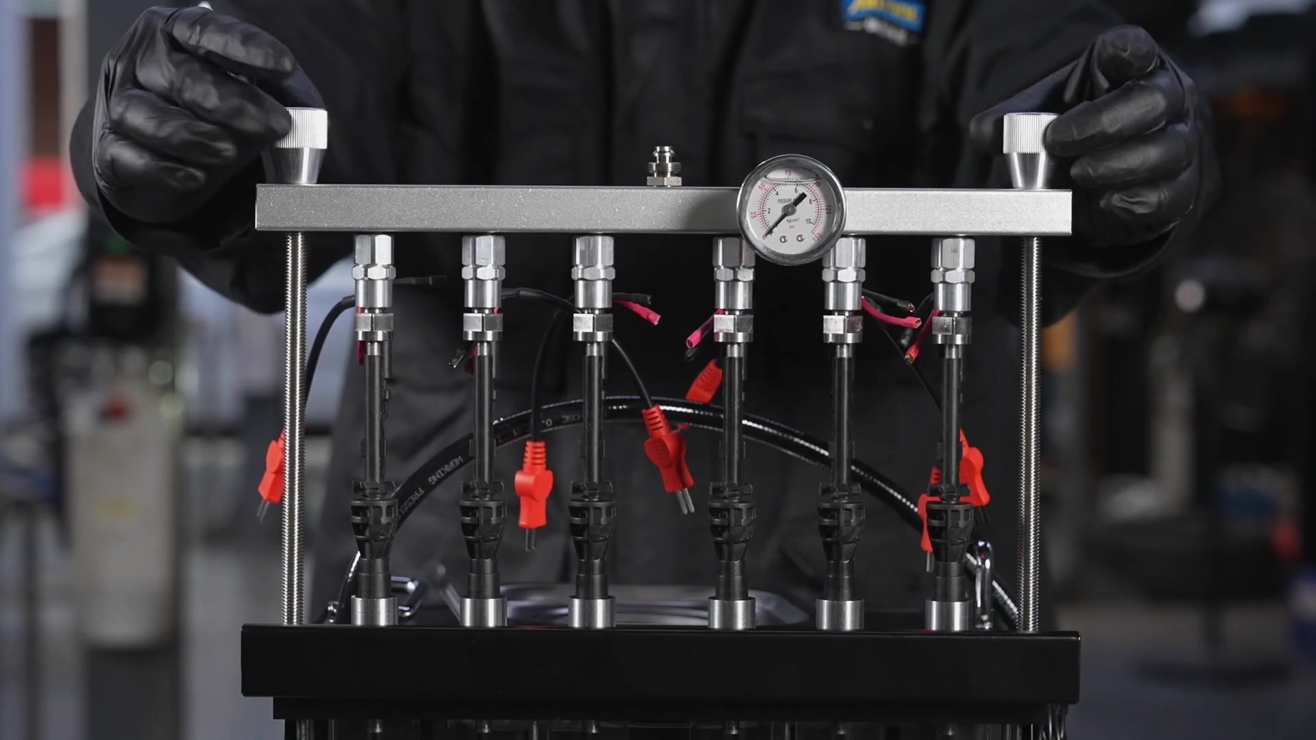 CT450 fuel distributor secured over six vertically mounted injectors