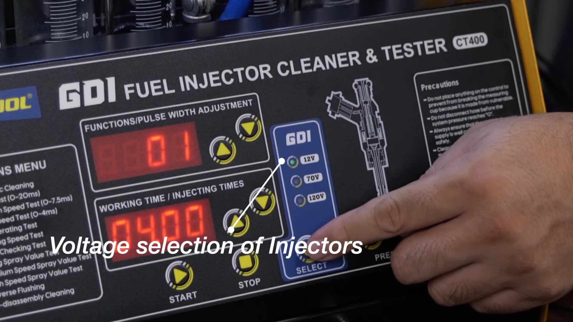 Operator selecting the specified CT400 injector drive-voltage setting