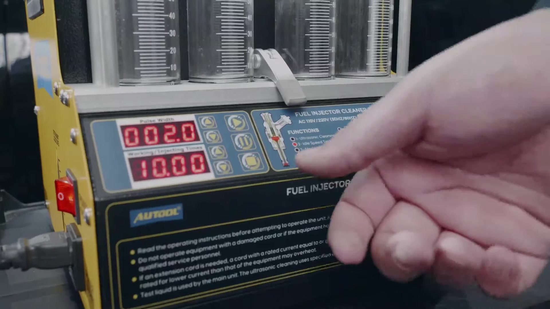 Operator setting a CT160 function and test time on the control panel