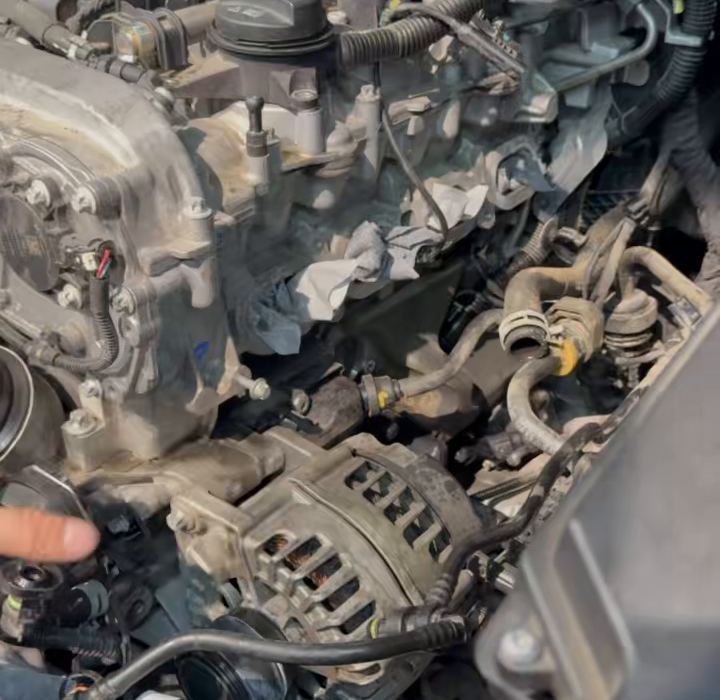 Side-pipe connection area identified in the engine bay.