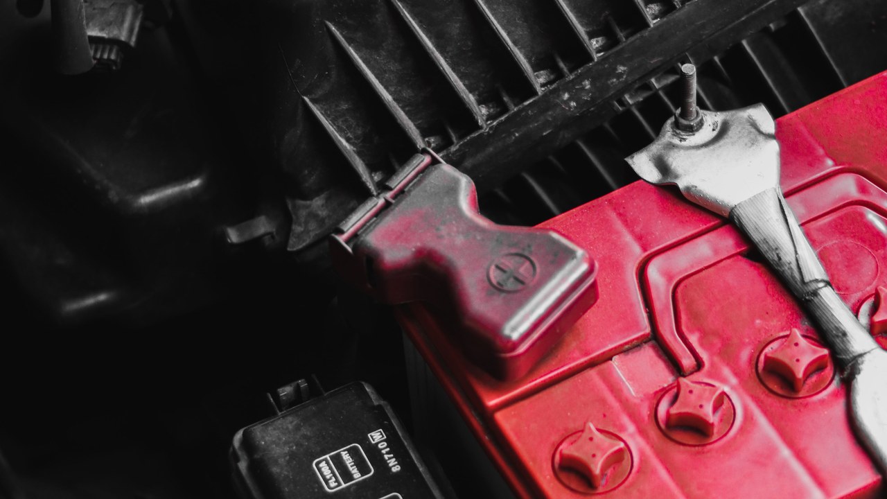 Installed 12-volt starter battery with its terminals accessible