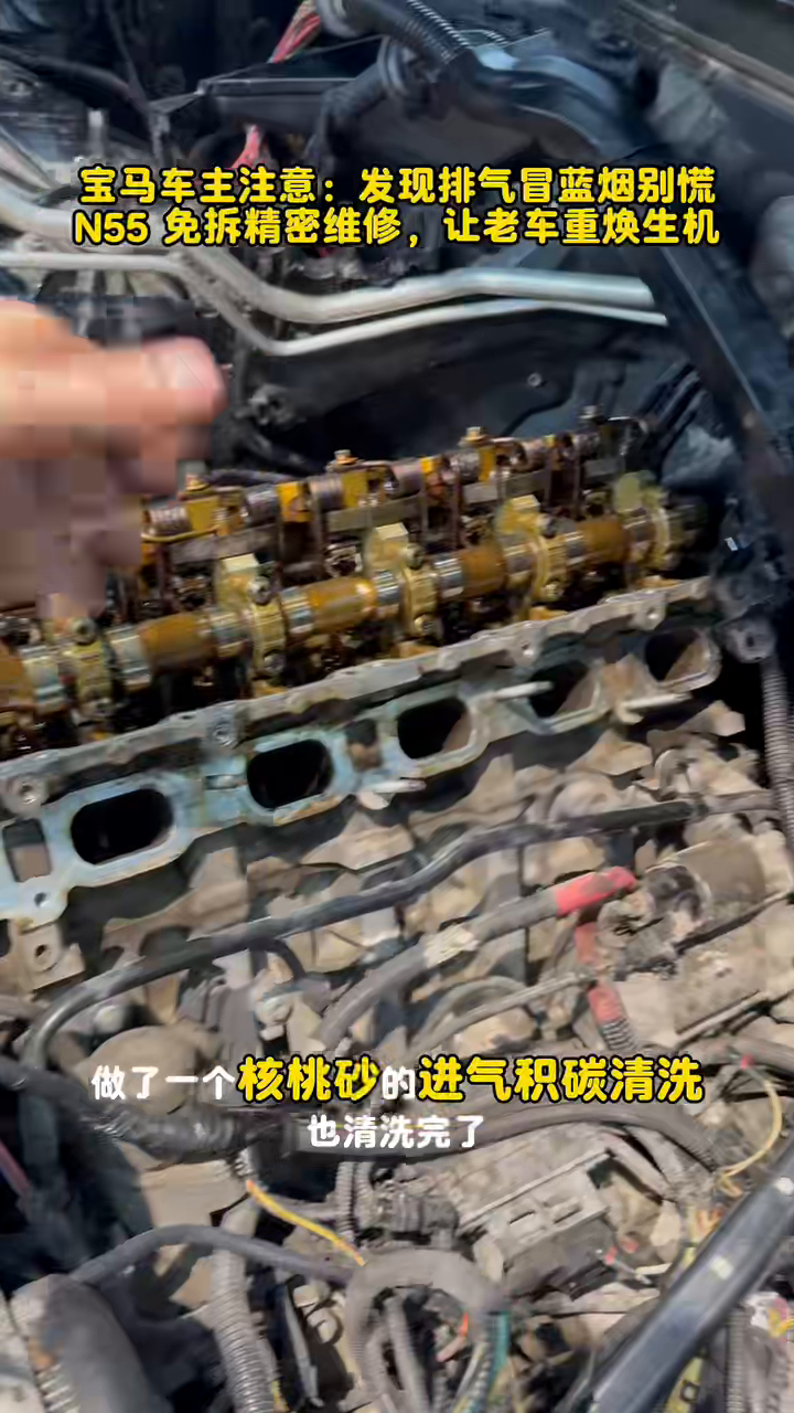 Intake-valve deposit cleaning during the BMW N55 valve seal repair.