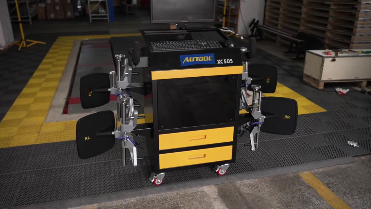 AUTOOL XC505 cart with all four labelled wheel clamps and targets mounted